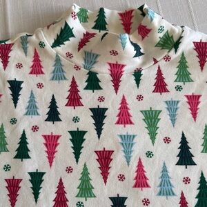 Women’s holiday mock turtleneck. New without tags. Extra large.
